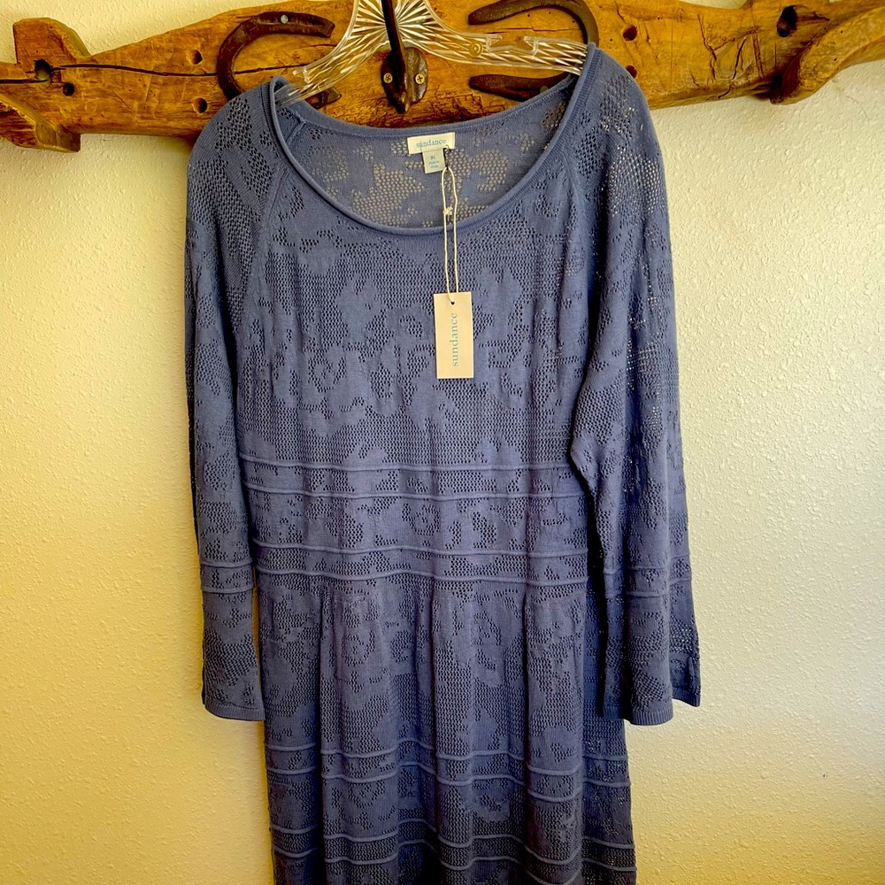 Pointelle dress a-line with 3/4 sleeve and roll edge neckline.  Danube Blue.